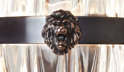 The Belzoni Lionhead Glass Pendant Light in Antique Bronze